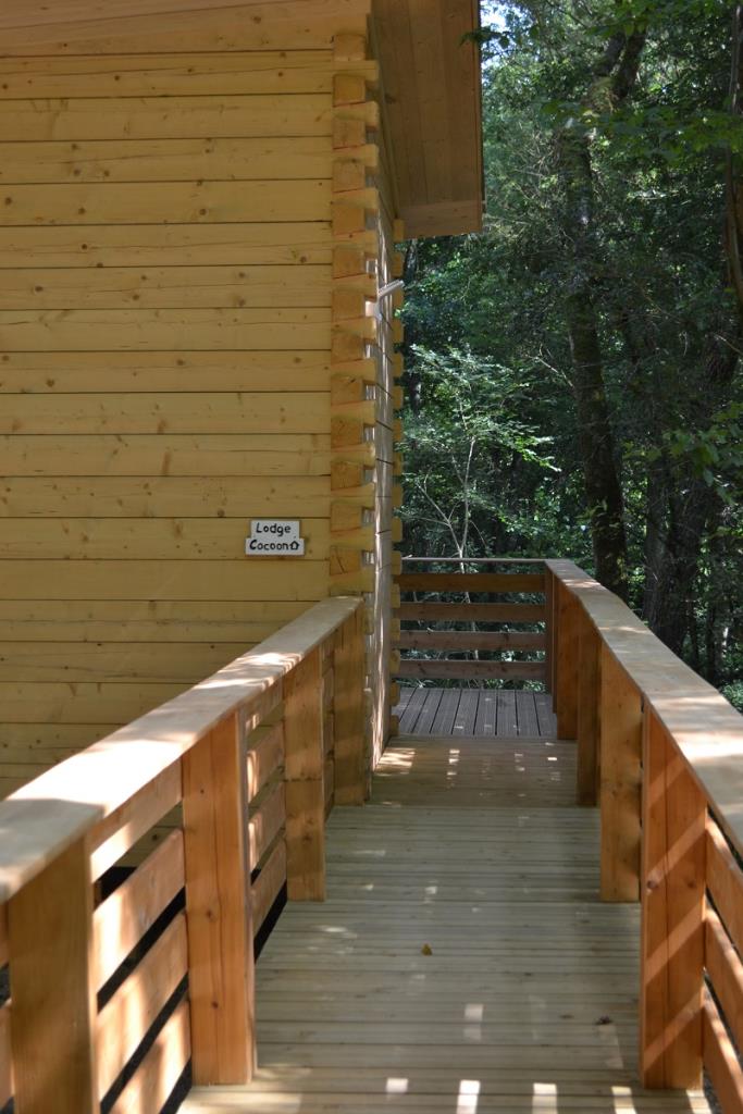 Lodge Cocoon : une expérience immersive en pleine nature à Magné — chambre