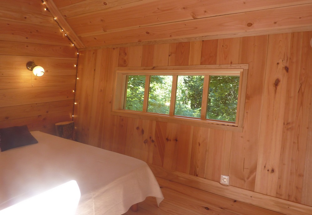 Cabane de Merlin : une immersion en pleine nature à Cros De Géorand — chambre