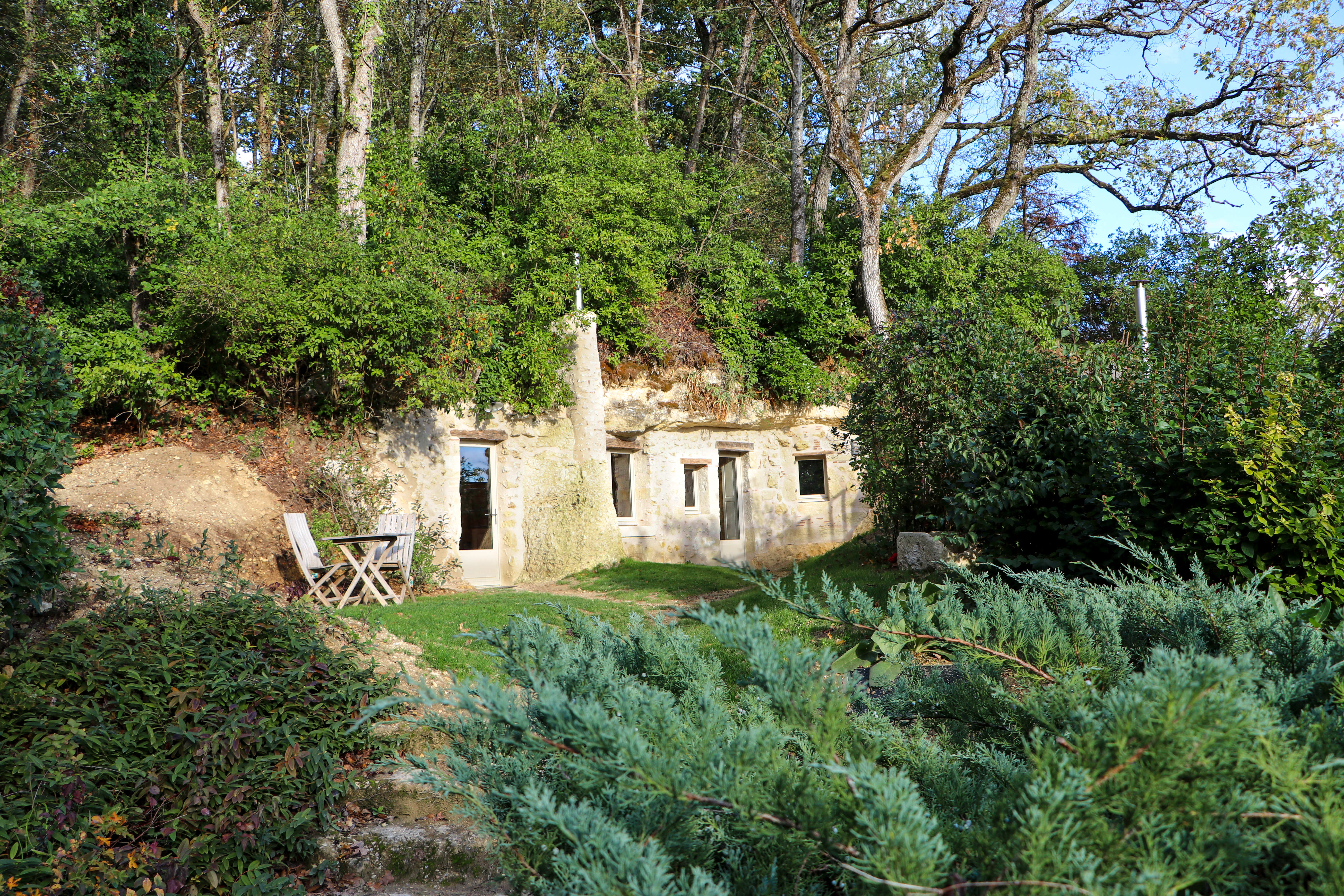 Terra Alta — Maison troglodyte avec bain nordique à Nazelles à Nazelles — chambre