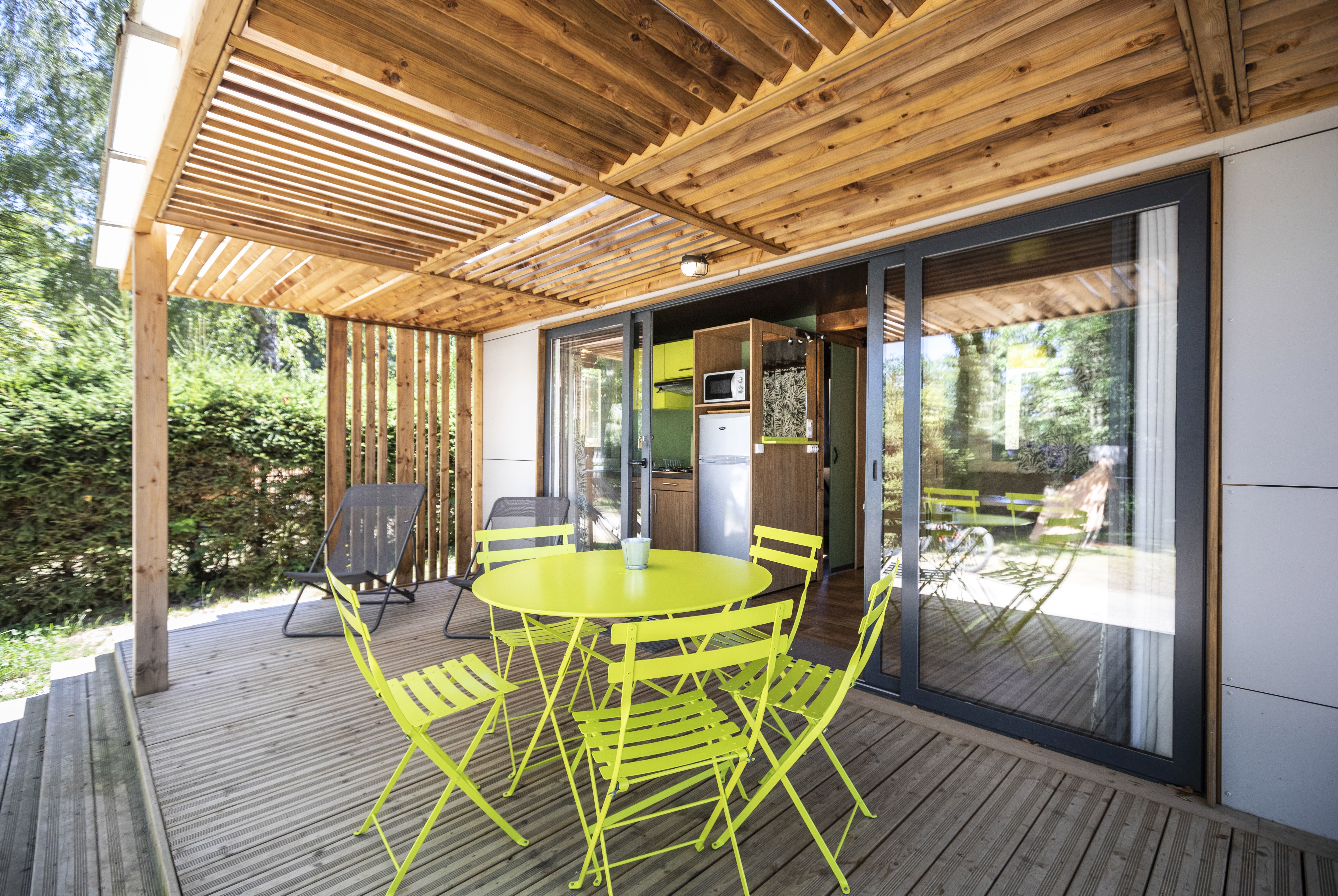Cabane Vancouver — Séjour confortable avec spa à Cantal à Madic — vue intérieure