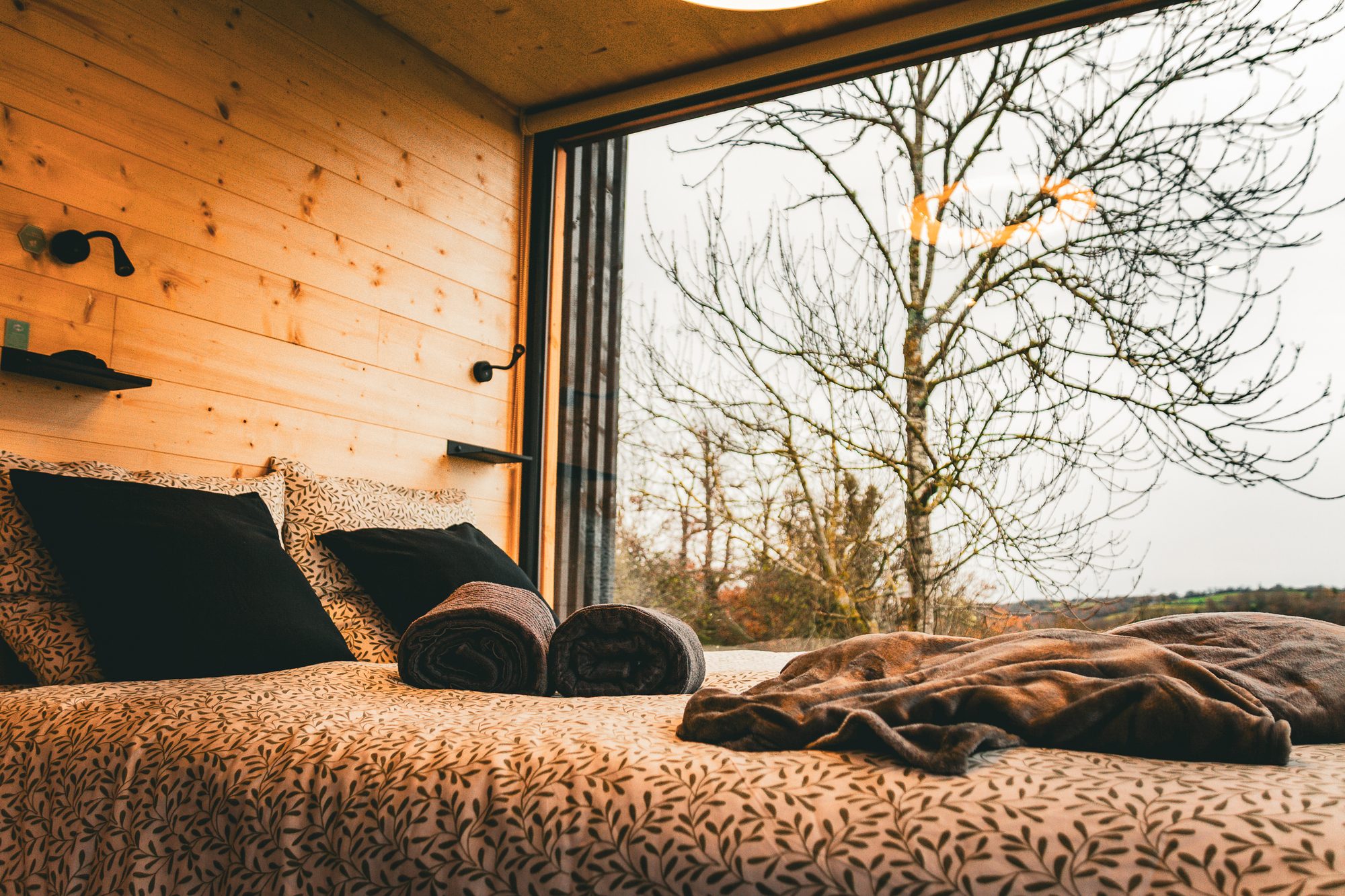 Homnest - Confins des Domes — Tiny House avec vue panoramique à Volvic (Puy-de-Dôme) à Volvic — vue intérieure