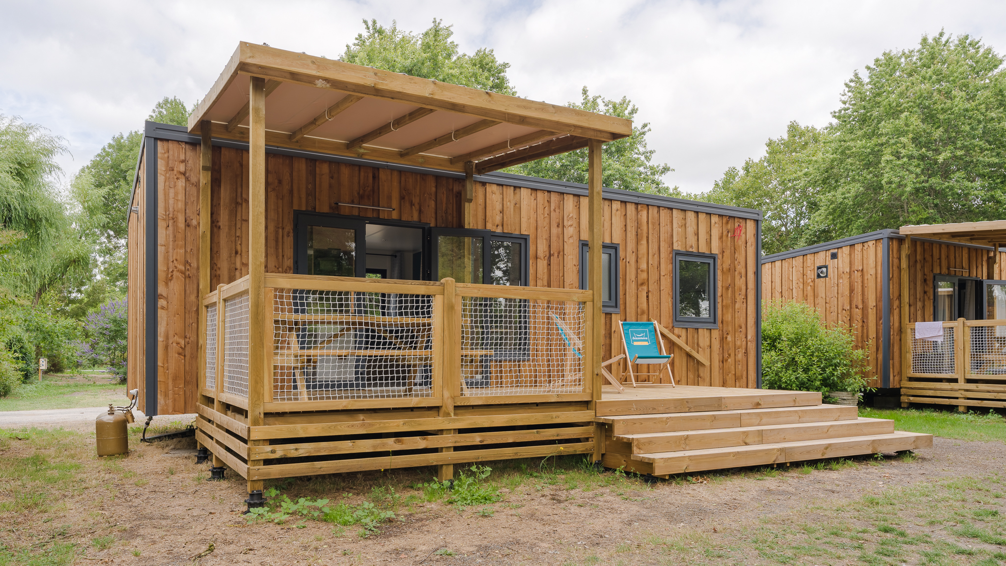 Cottage Prestige : un chalet enchanteur en pleine nature à Saint Julien De Concelles — espace de vie