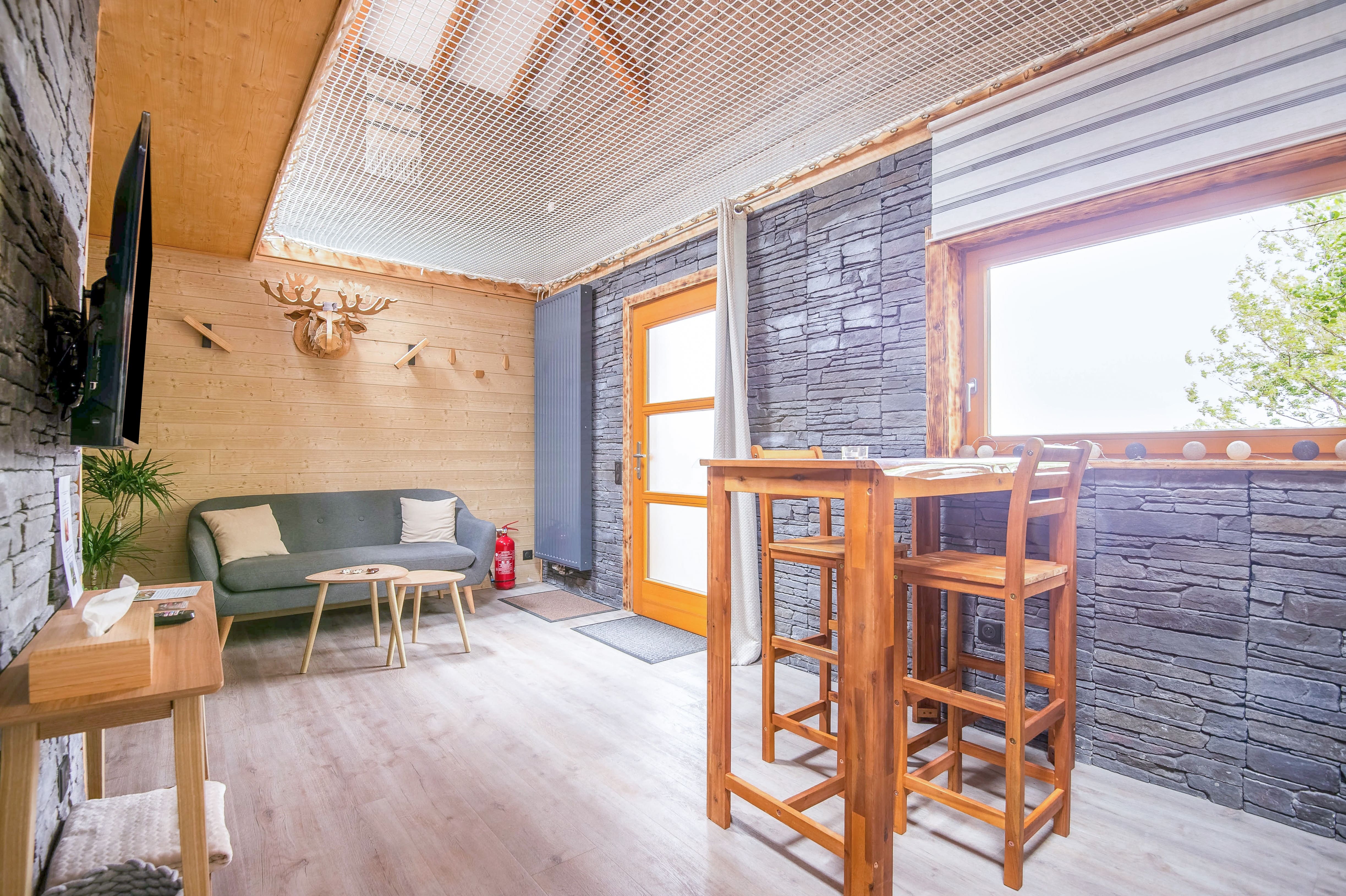 Cottage Spa Orion : une cabane sur pilotis pour une escapade romantique à Ville-Sur-Illon — chambre